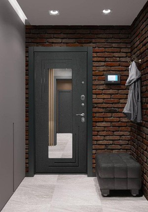 Входная дверь с зеркалом в интерьере в стиле лофт